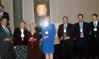 ICCTA past president Dr. Clare Ollayos (center) presents ICCTA's 2007 Business/Industry Partnership Award to Moraine Valley Community College and the Chicagoland Regional College Program.