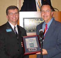 Jack Daley (right) receives his ICCTA Certificate of Merit from vice president Tom Bennett.