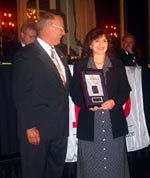 Karen Keasler (right) receives her Distinguished Alumnus Award from ICCTA past president Linden Warfel.