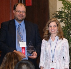 David Shenaut and Leticia Concalves of Monsanto Company accept ICCTA's 2012 Business/Industry Partnership Award.